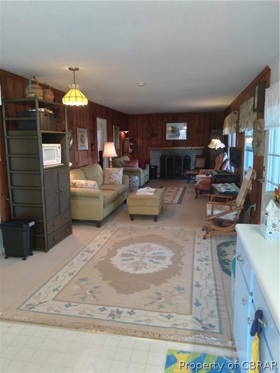 175 Seaside Way Gwynn, VA 23076 - Photo 12 of 48 a living room with furniture and a fireplace