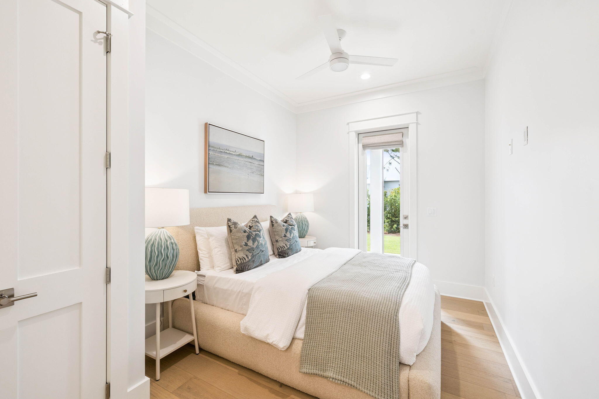 45 Grove Townhomes Place, Unit 104 Santa Rosa Beach, FL 32459 - Photo 25 of 36 a bedroom with a bed and a window