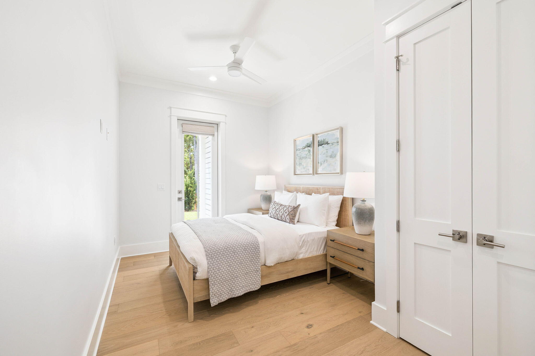 45 Grove Townhomes Place, Unit 104 Santa Rosa Beach, FL 32459 - Photo 27 of 36 a bedroom with a bed and a window