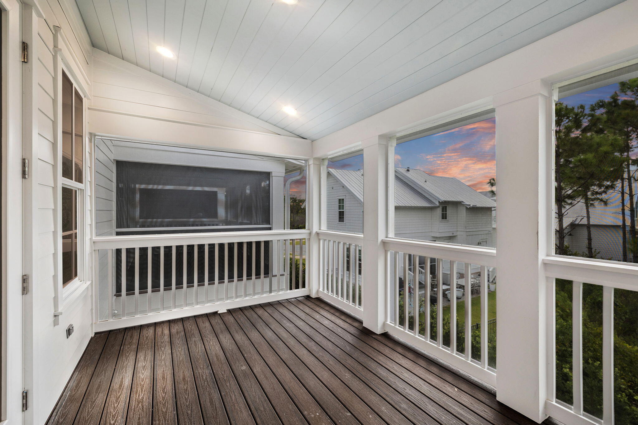 45 Grove Townhomes Place, Unit 104 Santa Rosa Beach, FL 32459 - Photo 30 of 36 a view of a balcony with wooden floor