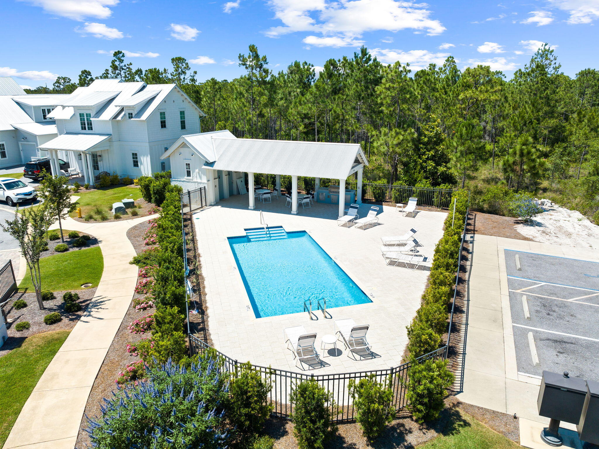 45 Grove Townhomes Place, Unit 104 Santa Rosa Beach, FL 32459 - Photo 36 of 36 an aerial view of a house with a yard and lake view