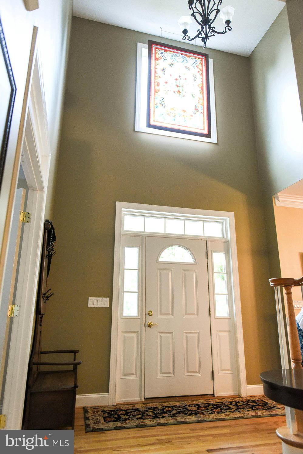18522 Cherryfield Road Drayden, MD 20630 - Photo 2 of 30 a view of a door with wooden floor