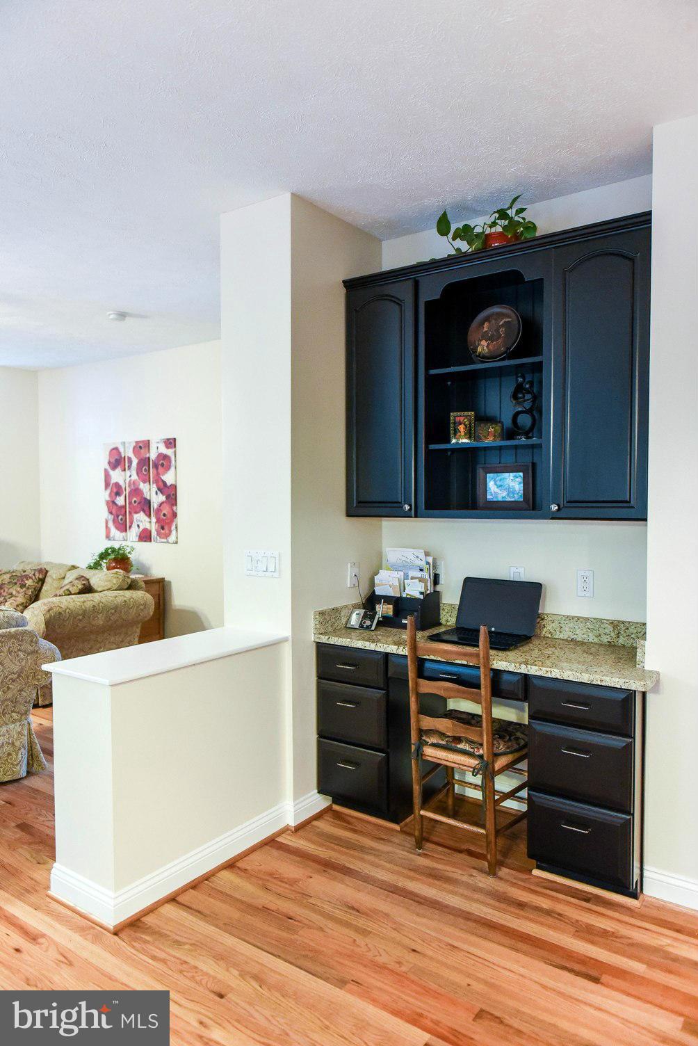 18522 Cherryfield Road Drayden, MD 20630 - Photo 5 of 30 a kitchen with a stove and a microwave