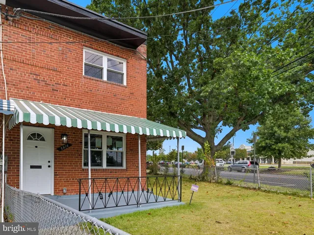 a front view of a house with swimming pool