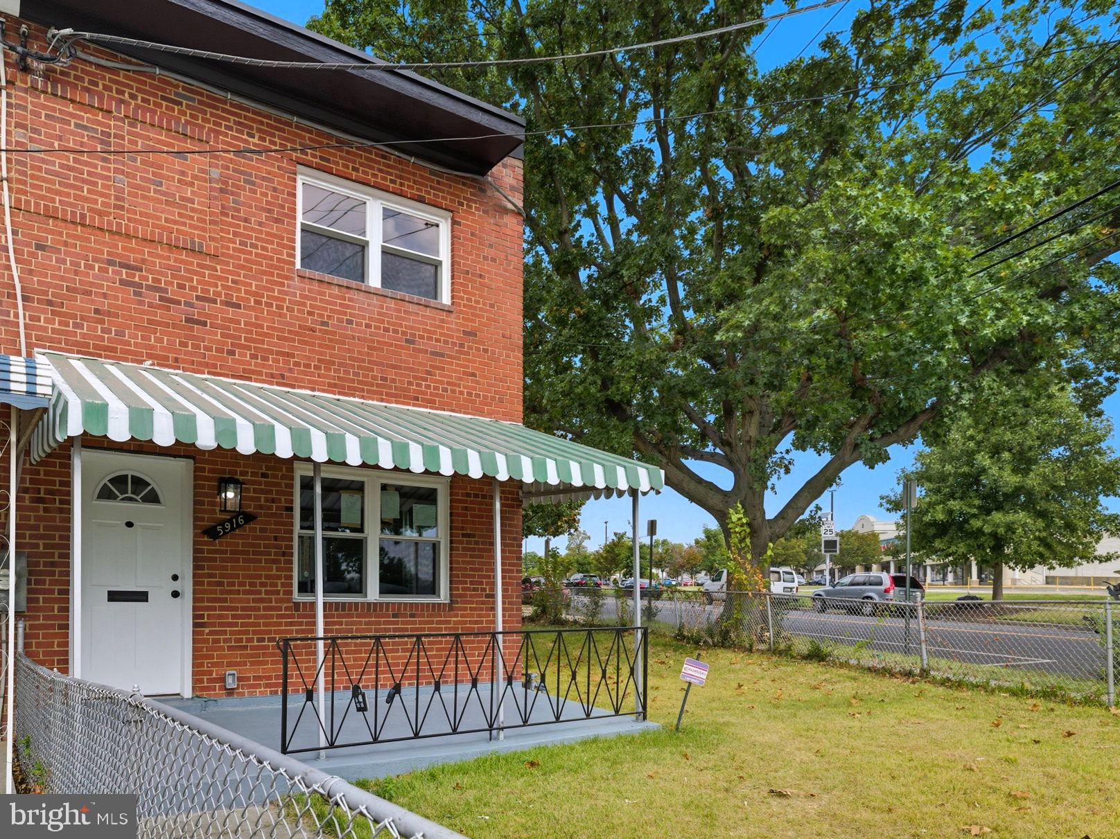 a front view of a house with swimming pool