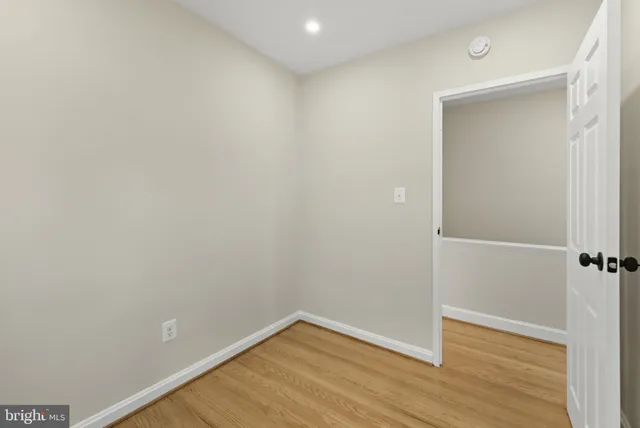 a view of small space with wooden floor