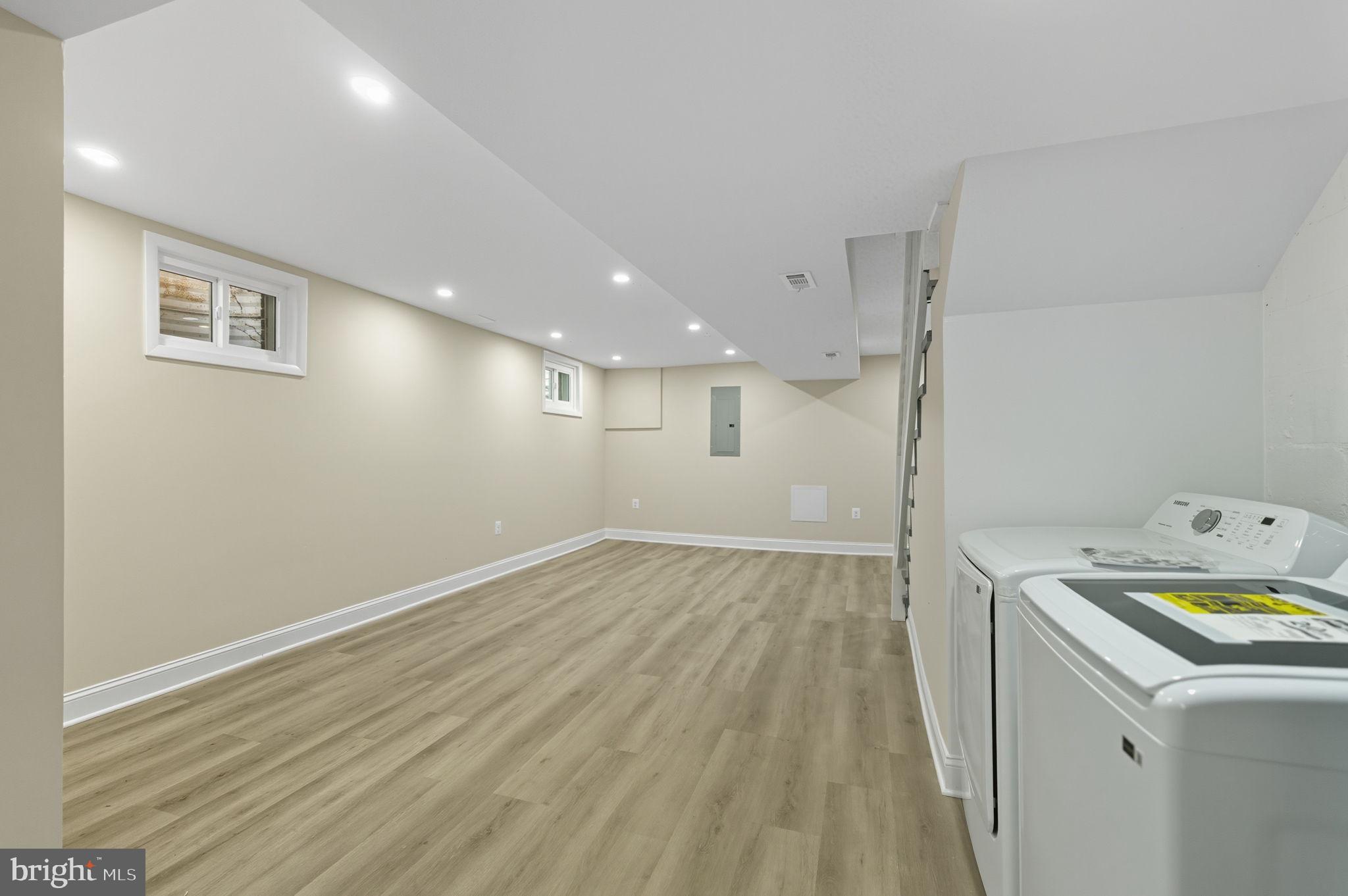 5916 8th Street Northeast Washington, DC 20011 - Photo 22 of 29 a view of storage and utility room in wooden floor