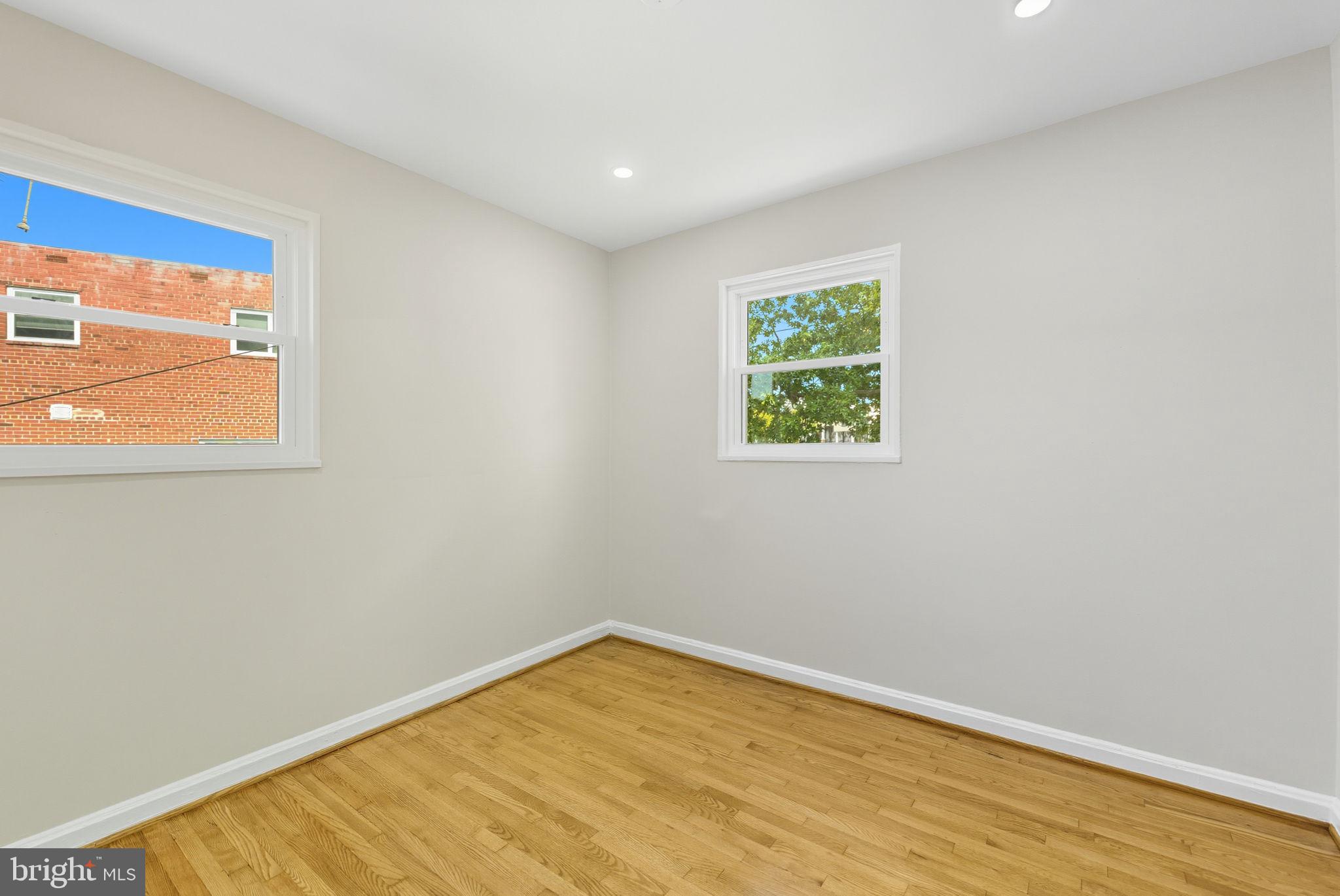 5916 8th Street Northeast Washington, DC 20011 - Photo 23 of 27 an empty room with a window