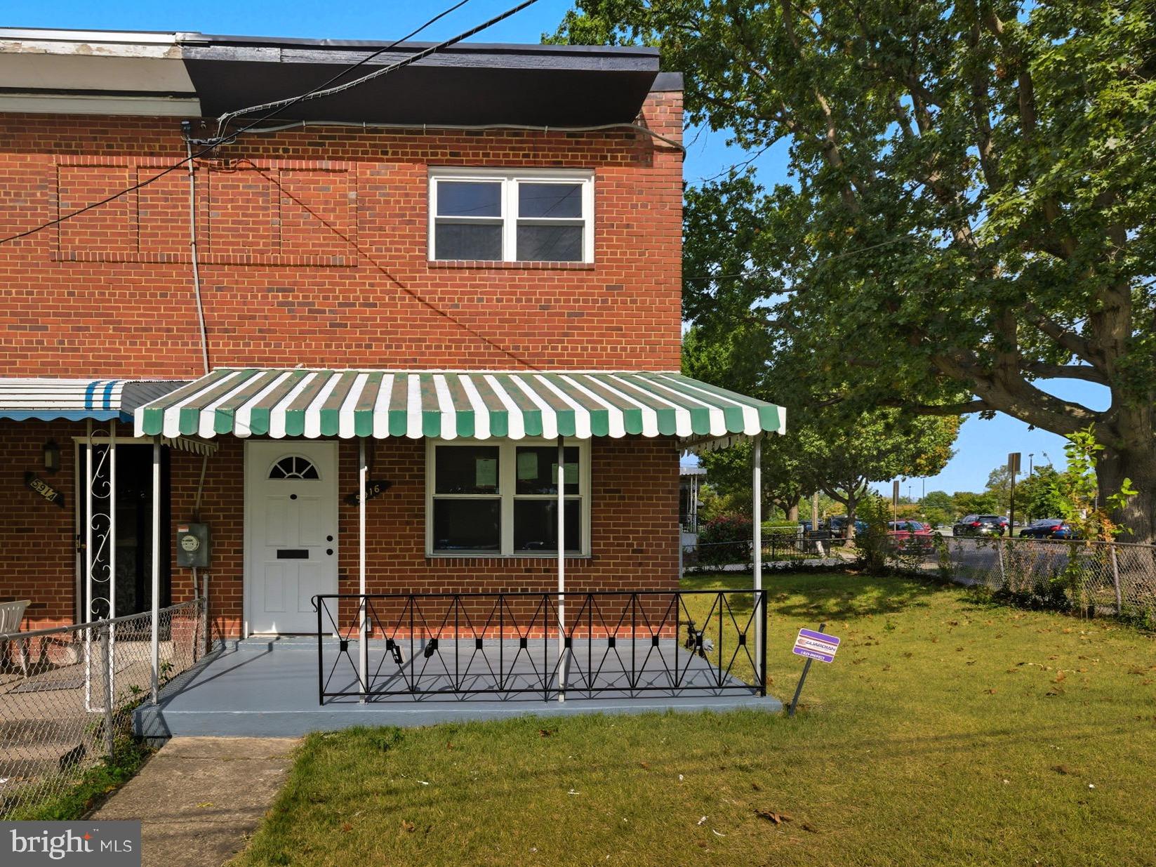 5916 8th Street Northeast Washington, DC 20011 - Photo 29 of 29 a view of a chairs and table under an umbrella
