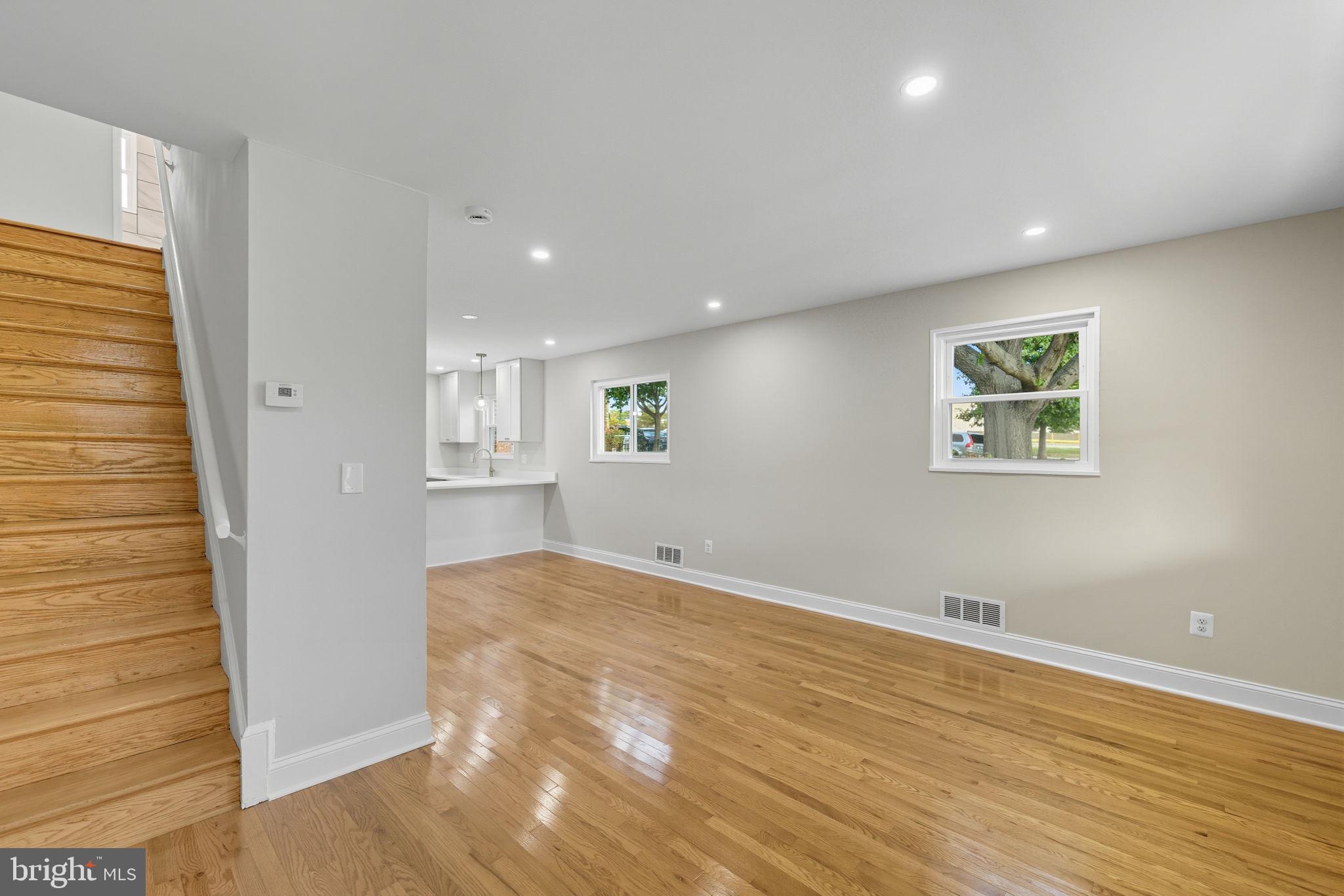 5916 8th Street Northeast Washington, DC 20011 - Photo 6 of 29 a view of livingroom with hardwood floor and hallway