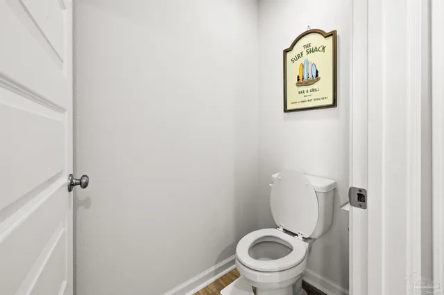 a bathroom with a toilet and a sink