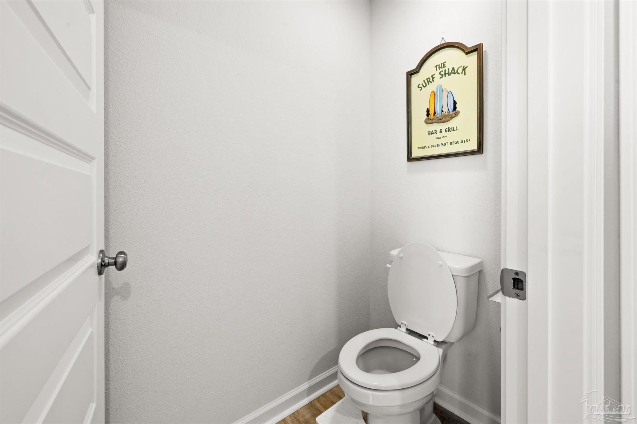 4774 Carl Booker Road Milton, FL 32583 - Photo 16 of 35 a bathroom with a toilet and a sink