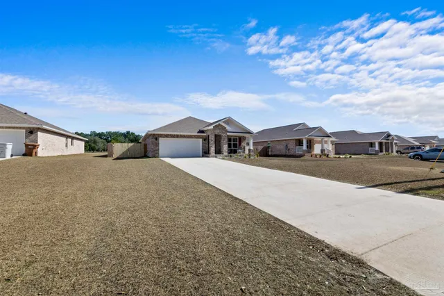 a view of swimming pool with lake view and mountain in the back