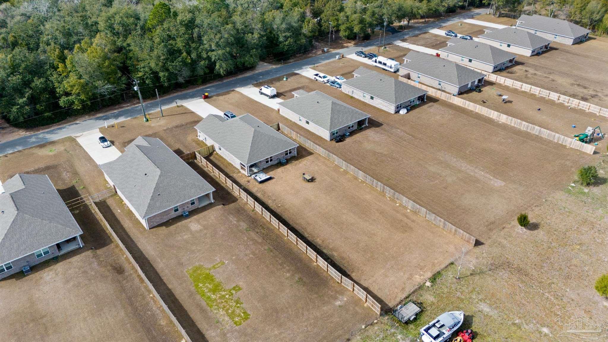 4774 Carl Booker Road Milton, FL 32583 - Photo 34 of 35 an aerial view of a house