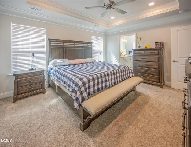 a kitchen with stainless steel appliances granite countertop a sink a stove and cabinets