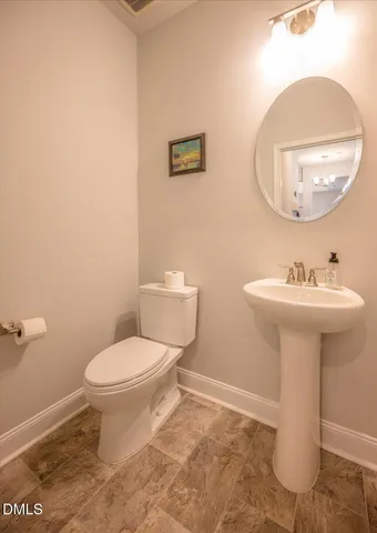 a bathroom with a sink double vanity and a mirror