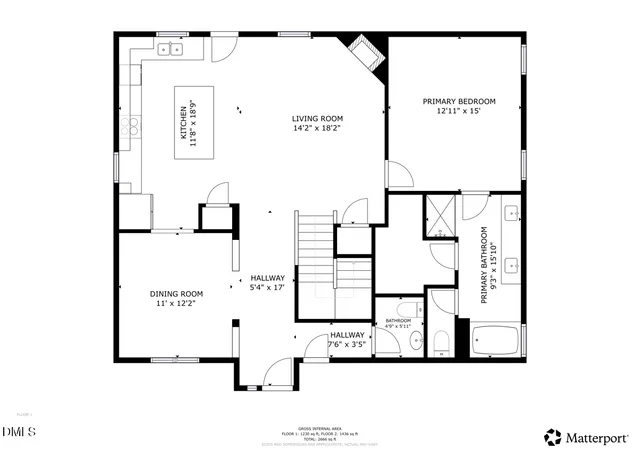 a view of a house with a garden and pathway