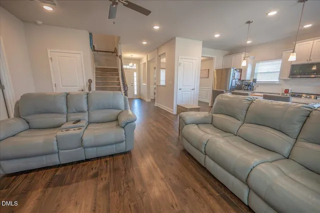 a view of kitchen and dining room with wooden floor