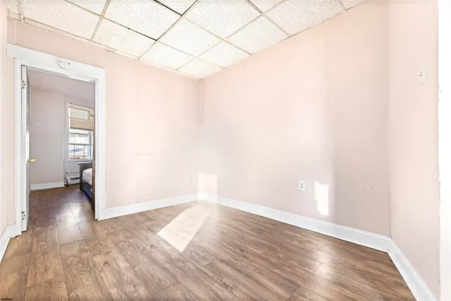 a view of livingroom with wooden floor