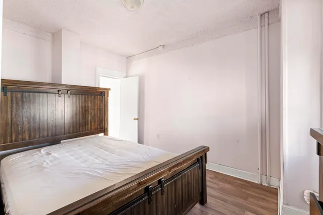 a view of kitchen with wooden floor