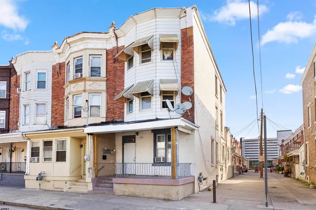 a front view of a multi story residential apartment building