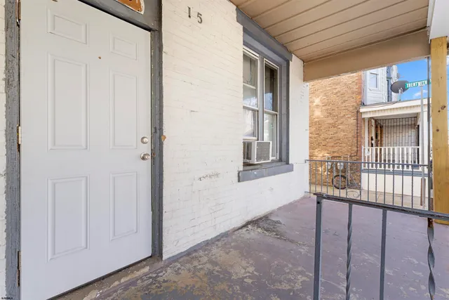a view of a hallway with windows