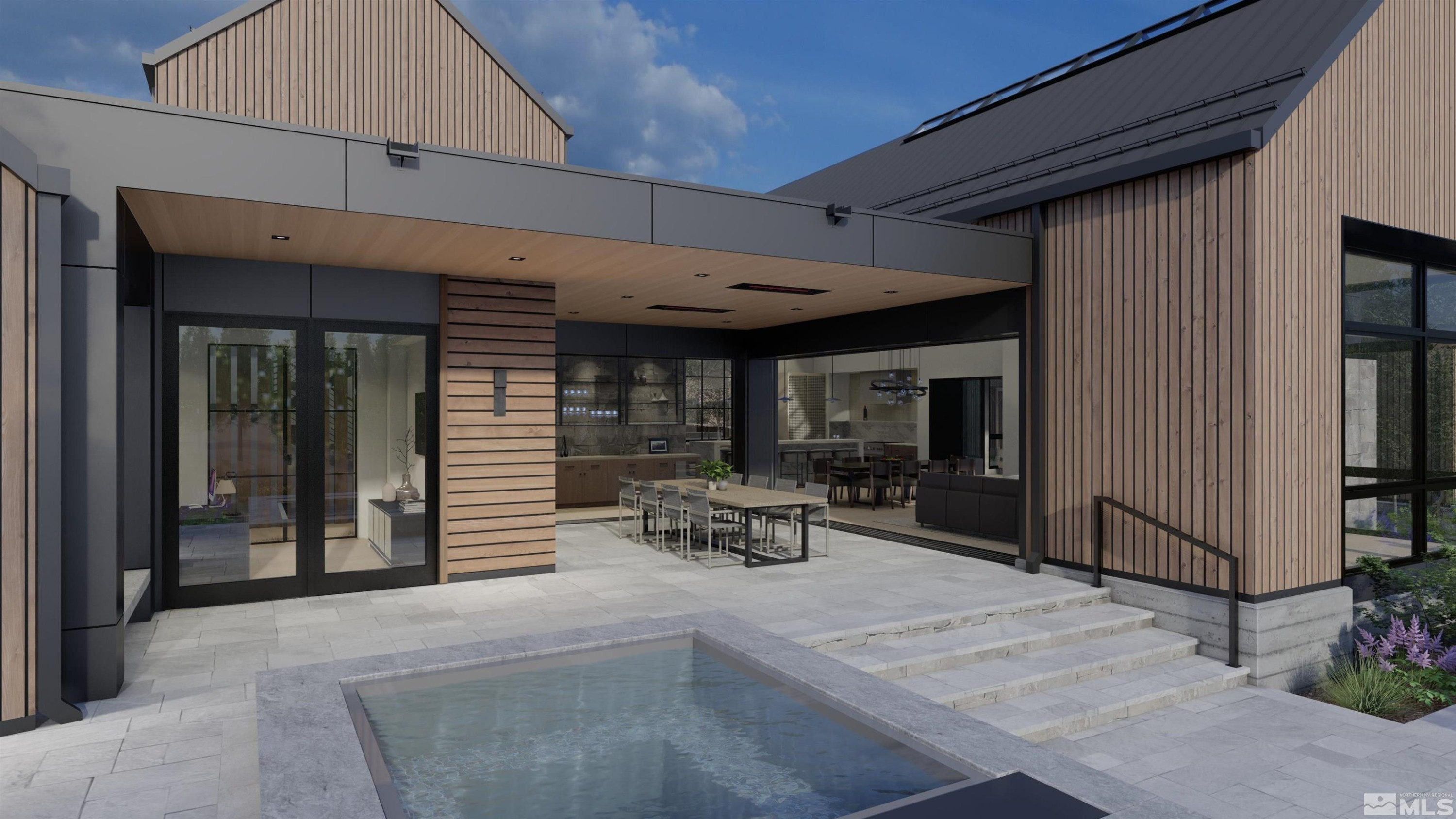 1005 Stag Ridge Court, Unit 5 Reno, NV 89519 - Photo 9 of 23 a view of a patio with table and chairs and potted plants