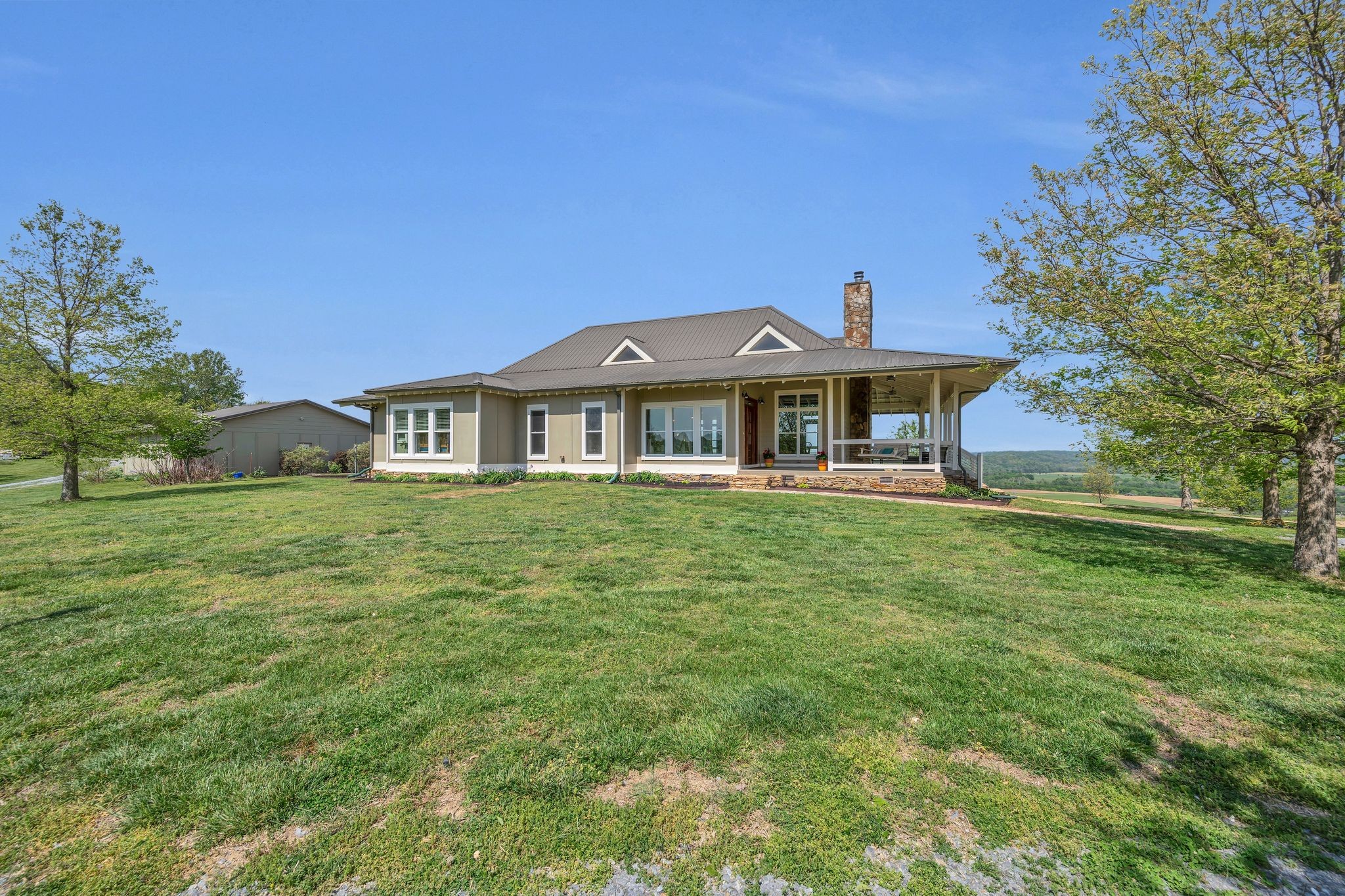 39 Fayetteville Road Kelso, TN 37348 - Photo 7 of 75 a front view of a house with garden