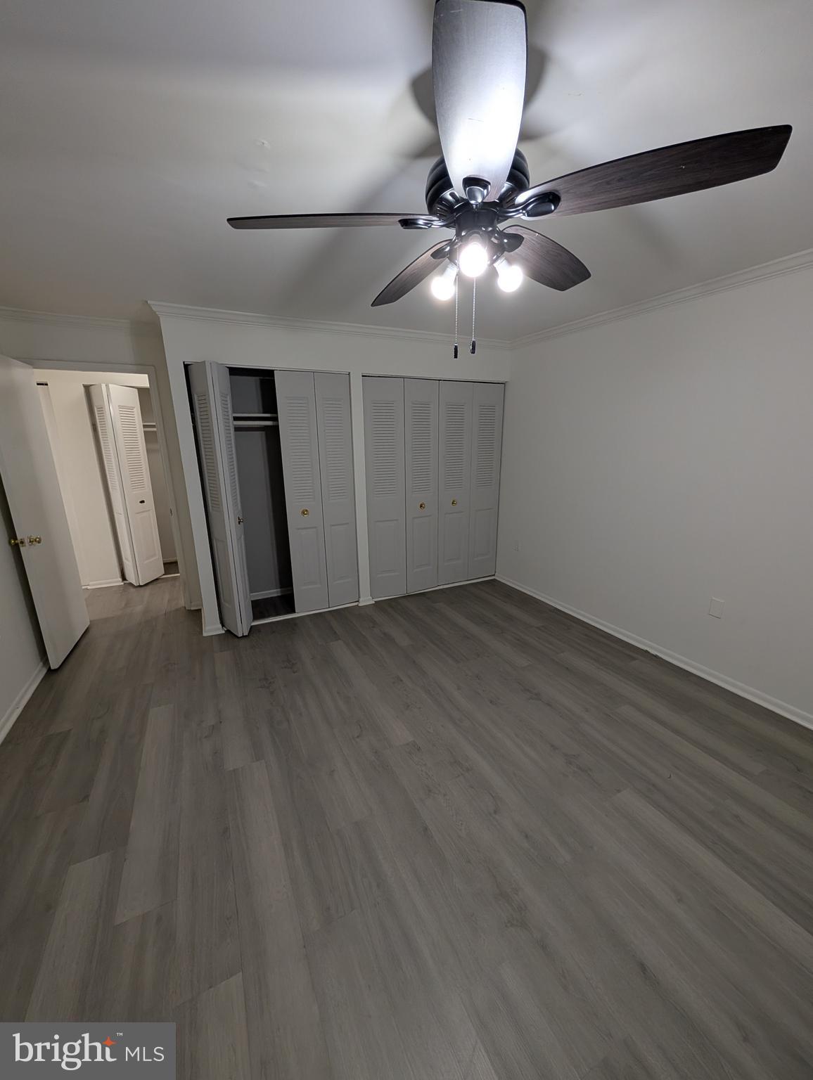 11402 Cherry Hill Road, Unit 103 Beltsville, MD 20705 - Photo 4 of 26 a view of an empty room with a window