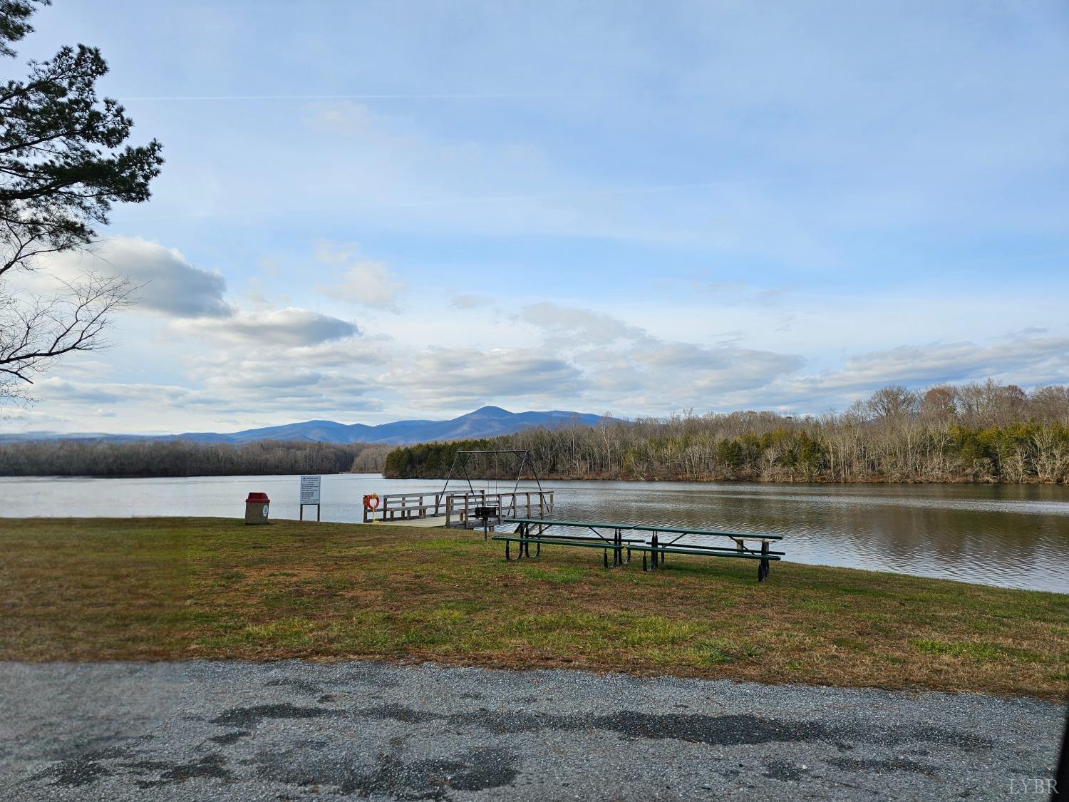 2066 Turkey Mountain Road Amherst, VA 24521 - Photo 3 of 17 a view of a lake with houses in the back