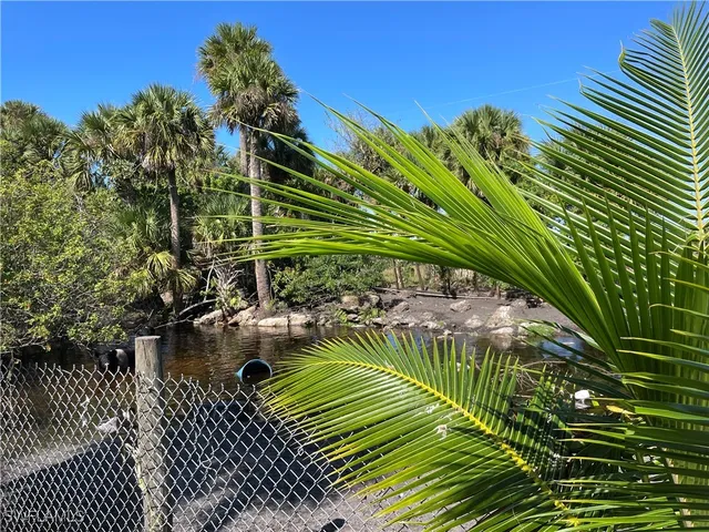 a view of a town with mountains in the background