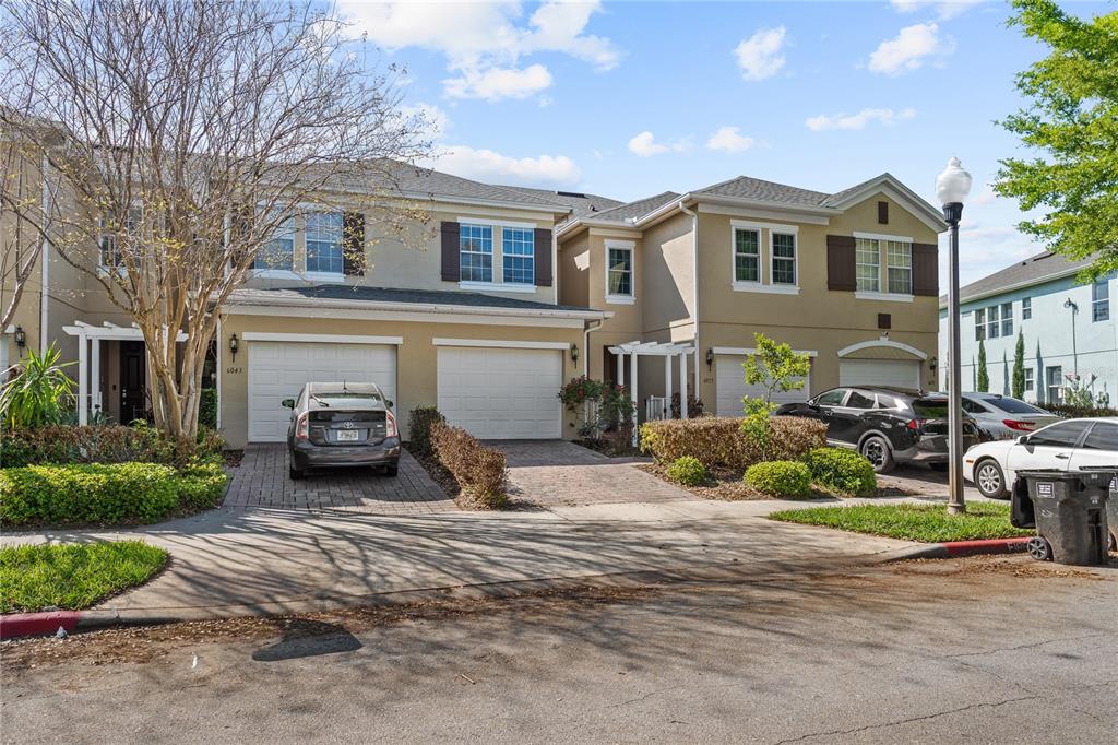 6039 Strada Isle Way Orlando, FL 32835 - Photo 2 of 24 a house view with a outdoor space