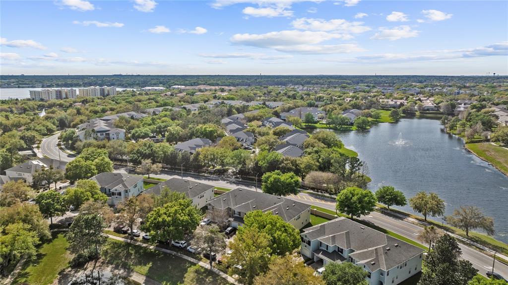 6039 Strada Isle Way Orlando, FL 32835 - Photo 22 of 24 an aerial view of a city with lots of residential buildings