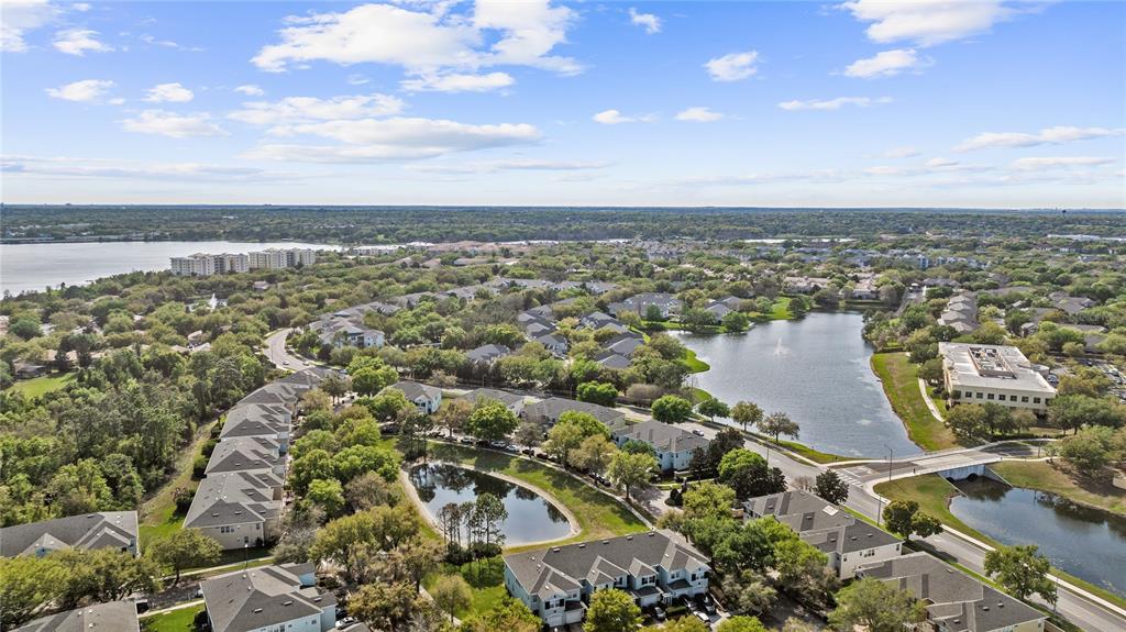 6039 Strada Isle Way Orlando, FL 32835 - Photo 23 of 24 an aerial view of a city