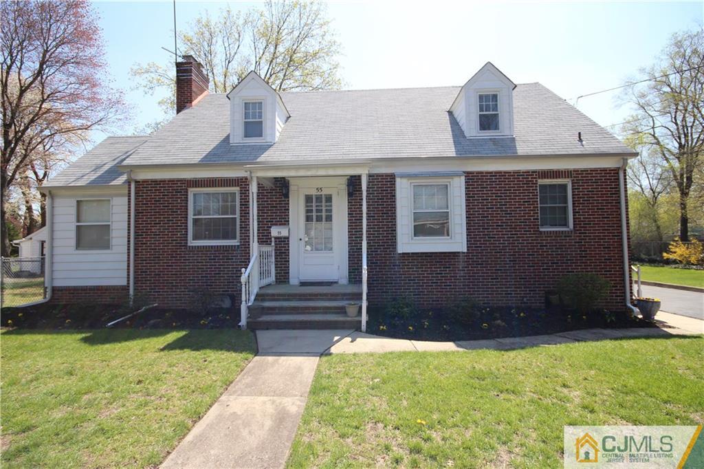 55 Milltown Road East Brunswick, NJ 08816 - Photo 1 of 18 a front view of a house with a yard