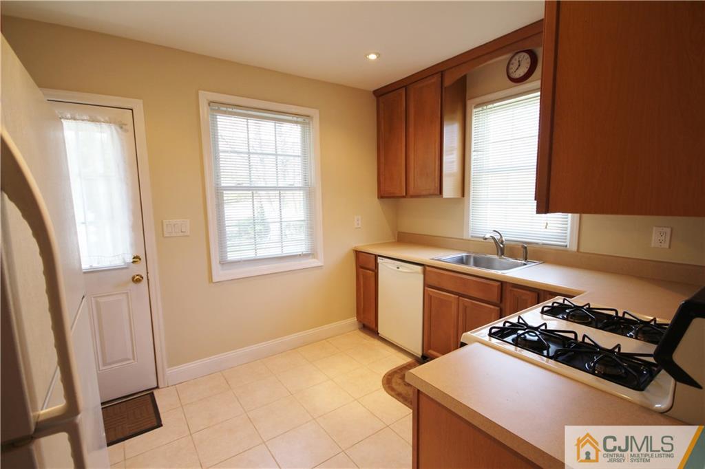 55 Milltown Road East Brunswick, NJ 08816 - Photo 6 of 18 a kitchen with a stove and a sink