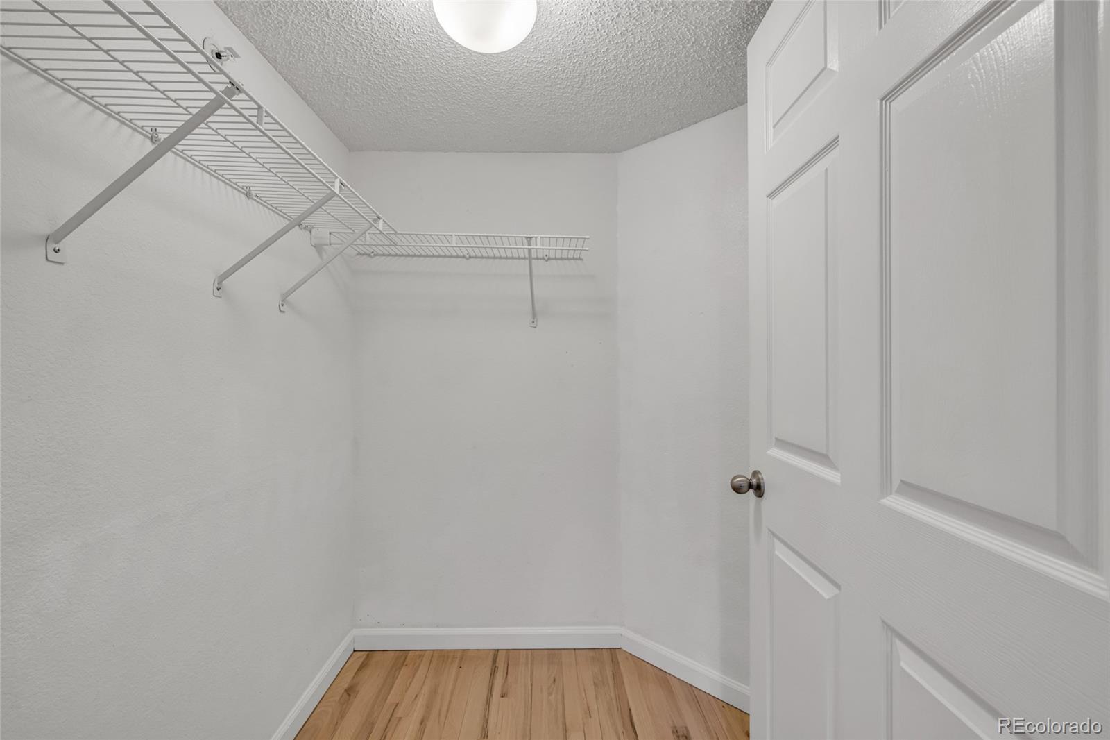 4870 Twin Lakes Road, Unit 1 Boulder, CO 80301 - Photo 14 of 26 a view of a room with racks on the wall
