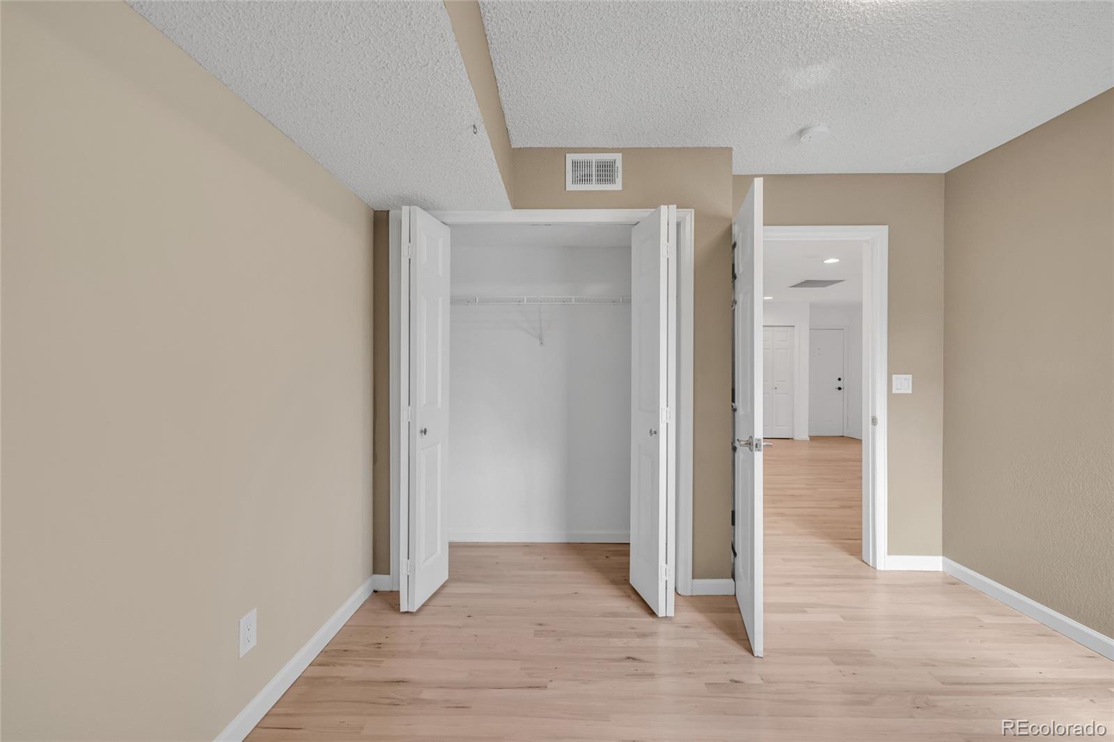 4870 Twin Lakes Road, Unit 1 Boulder, CO 80301 - Photo 17 of 26 wooden floor and window in a room