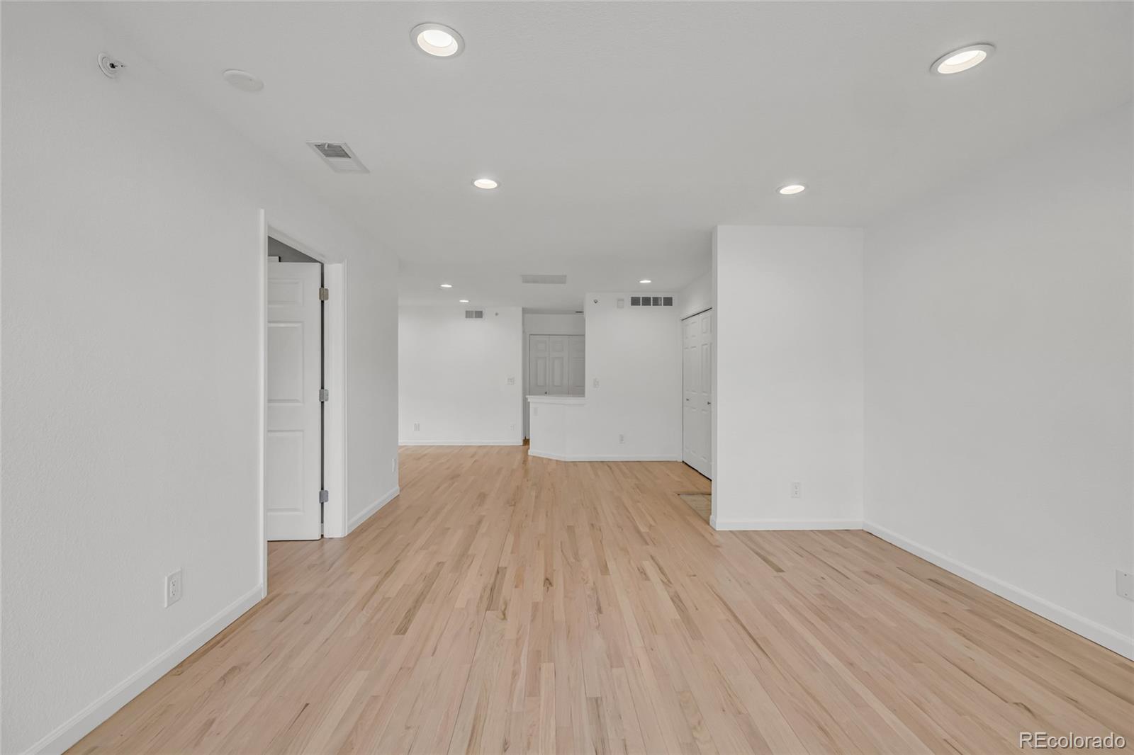 4870 Twin Lakes Road, Unit 1 Boulder, CO 80301 - Photo 19 of 26 a view of empty room with wooden floor