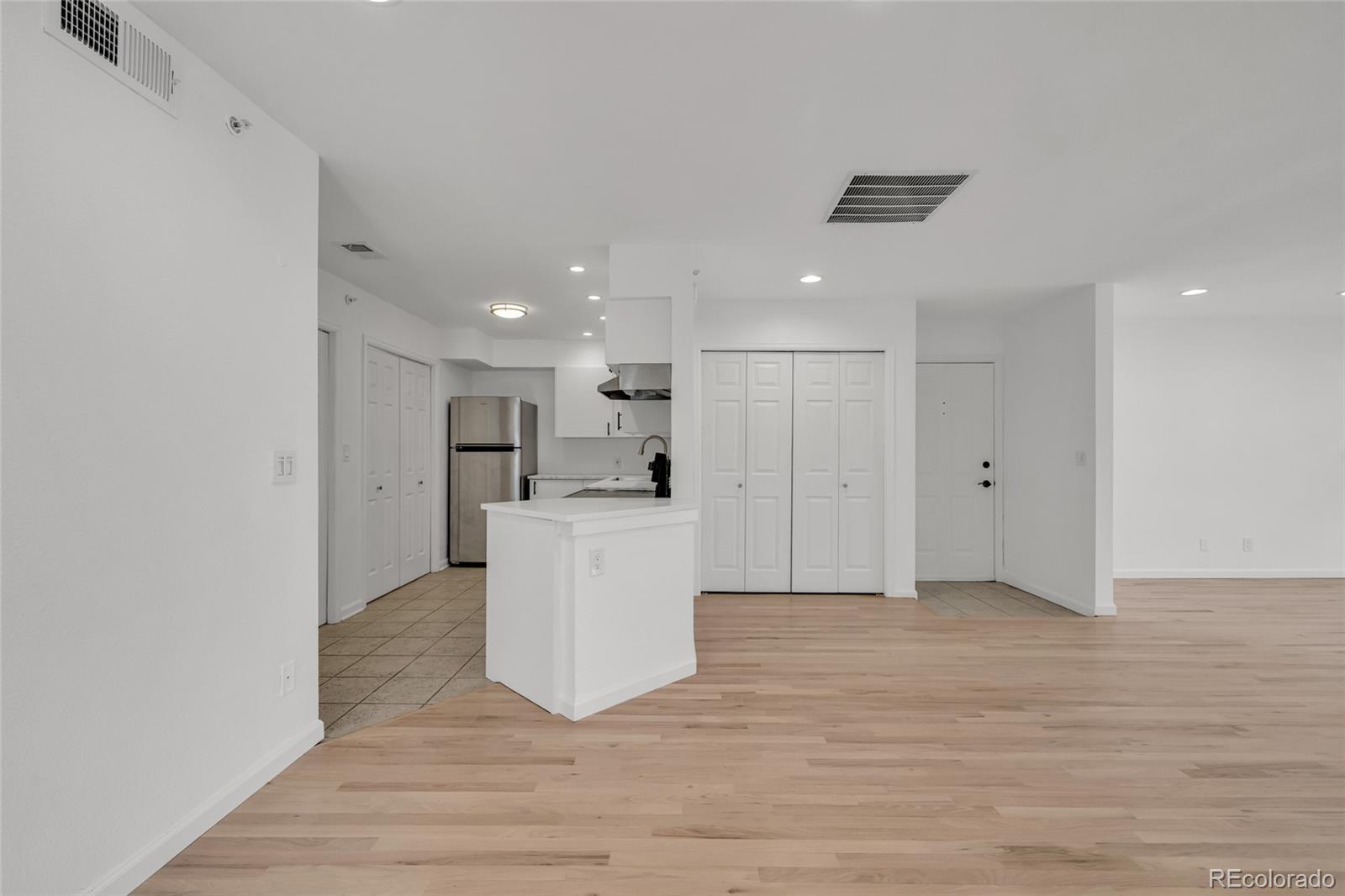 4870 Twin Lakes Road, Unit 1 Boulder, CO 80301 - Photo 7 of 26 a view of kitchen with wooden floor