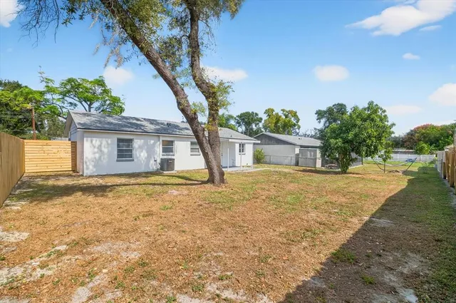 a house with trees in front of it