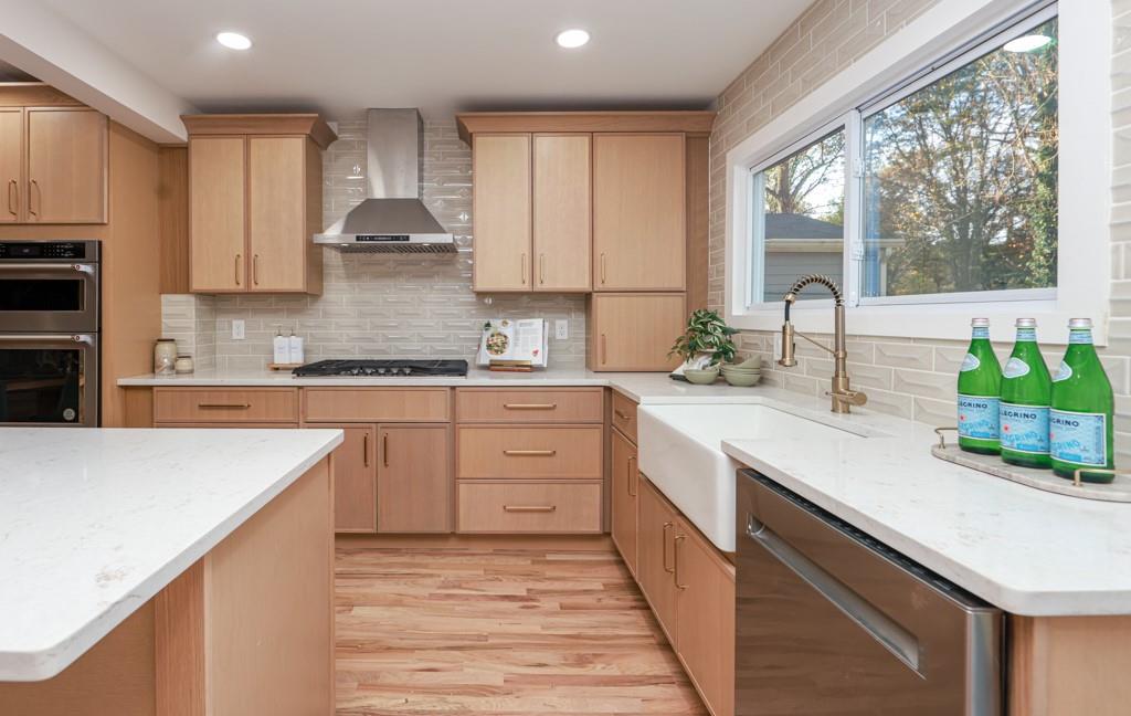 2566 Creekwood Terrace Decatur, GA 30030 - Photo 13 of 49 a kitchen with a sink stove and cabinets