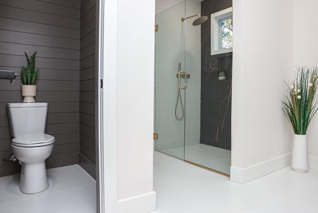 2566 Creekwood Terrace Decatur, GA 30030 - Photo 27 of 49 a bathroom with a toilet and a shower