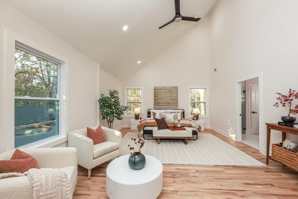 2566 Creekwood Terrace Decatur, GA 30030 - Photo 33 of 49 a living room with furniture and a large window