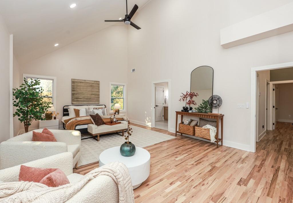 2566 Creekwood Terrace Decatur, GA 30030 - Photo 35 of 49 a living room with furniture and a wooden floor