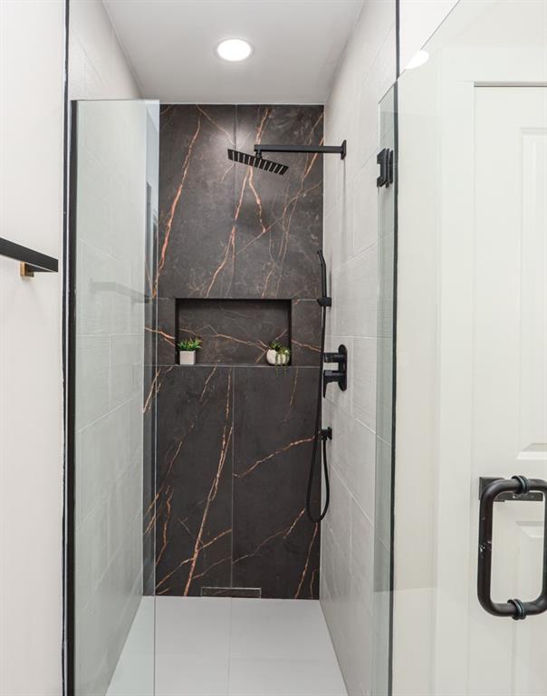 2566 Creekwood Terrace Decatur, GA 30030 - Photo 37 of 49 a bathroom with a shower