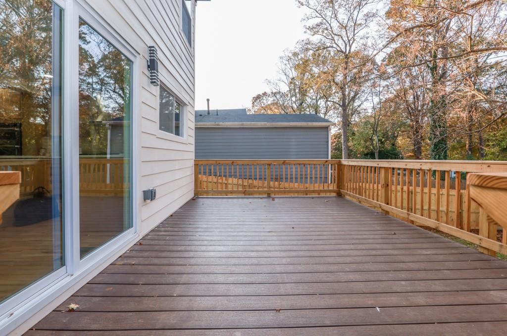 2566 Creekwood Terrace Decatur, GA 30030 - Photo 46 of 49 a view of a balcony with wooden floor