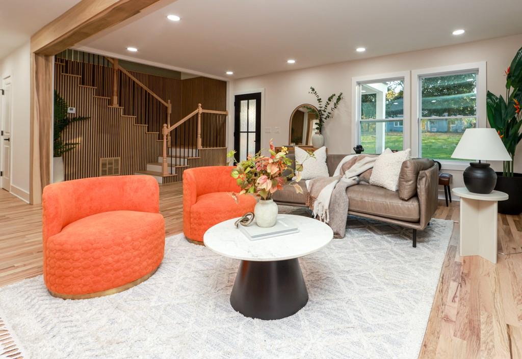 2566 Creekwood Terrace Decatur, GA 30030 - Photo 9 of 49 a living room with furniture a window and a table