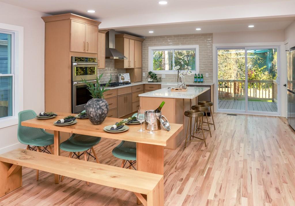 2566 Creekwood Terrace Decatur, GA 30030 - Photo 10 of 49 a living room with stainless steel appliances kitchen island granite countertop furniture a rug kitchen view and a large window