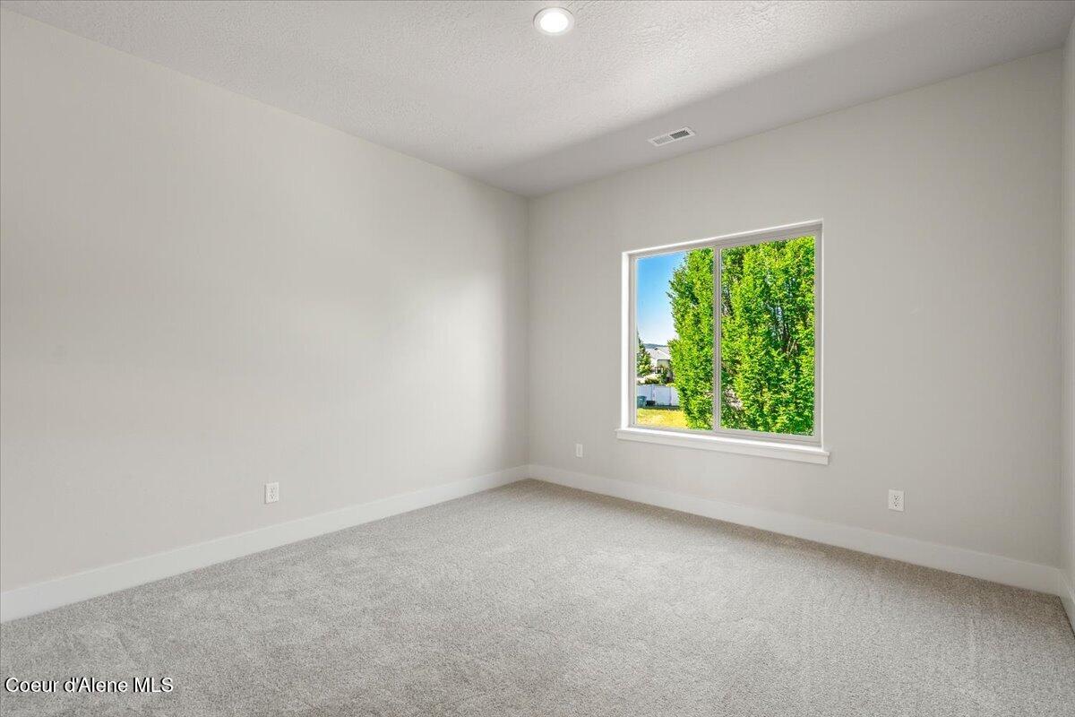 771 North Galbraith Loop Post Falls, ID 83854 - Photo 24 of 34 Secondary Bedroom